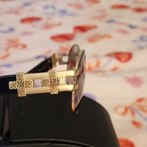 Yves Saint Laurent Gold and Black Women's Sunglasses with Decorative Hinges